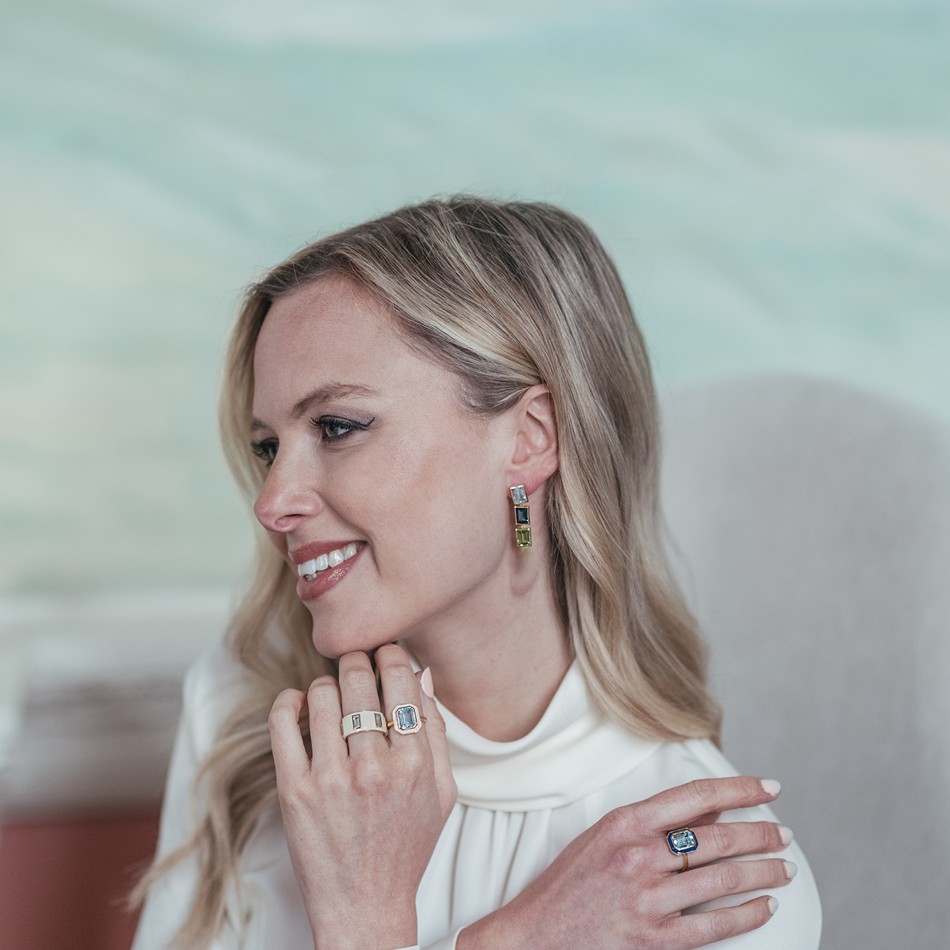 Model wearing Sky Blue Topaz, London Blue Topaz and Peridot 3 Drop Earrings
