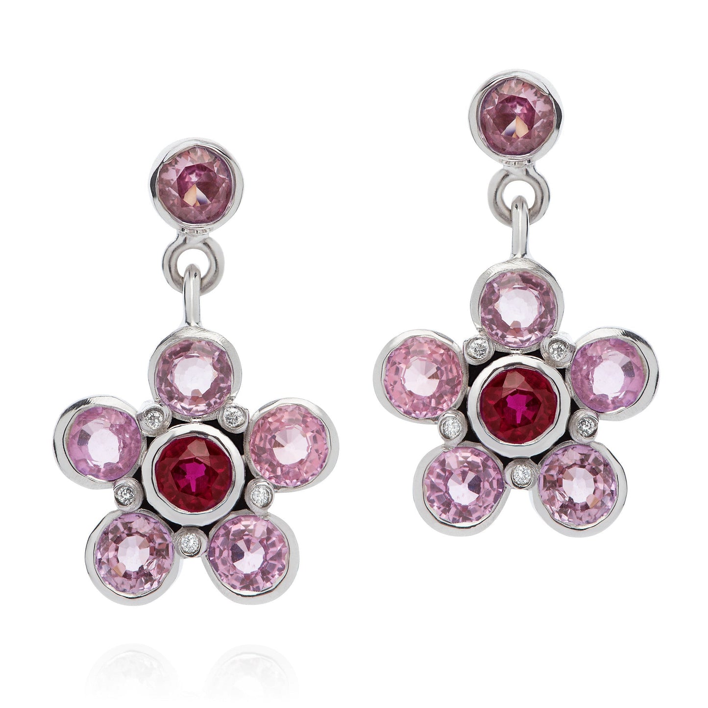 Pink Sapphire, Ruby, & Diamond Earrings on a silver clasp with the ruby gemstone at the centre and four pink sapphire gemstones circled on the outside of the ruby centre with 5 small diamonds on each earring| Augustine Jewels | Gemstone jewelry