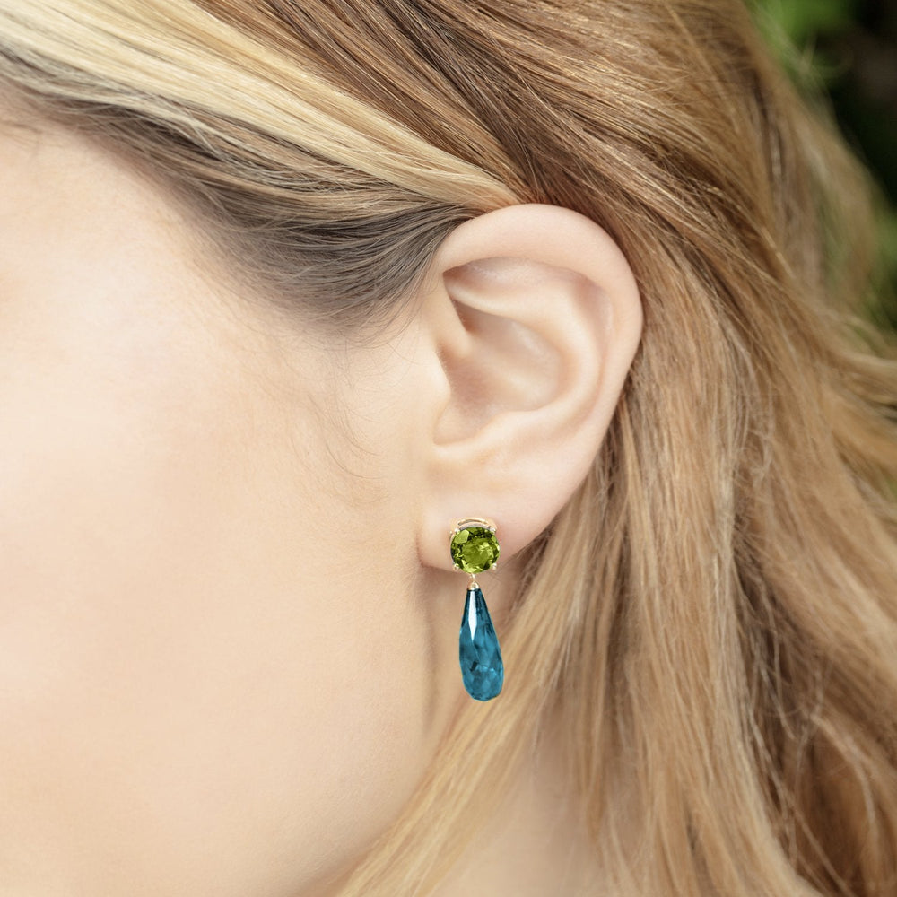 
                  
                    Model wearing Teal Topaz & Peridot Gold Drop Earrings
                  
                