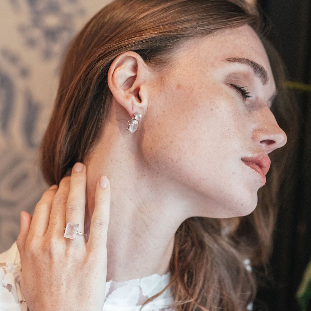 
                  
                    Model wearing Sterling Silver or White Gold Rose Quartz Drop Earrings
                  
                