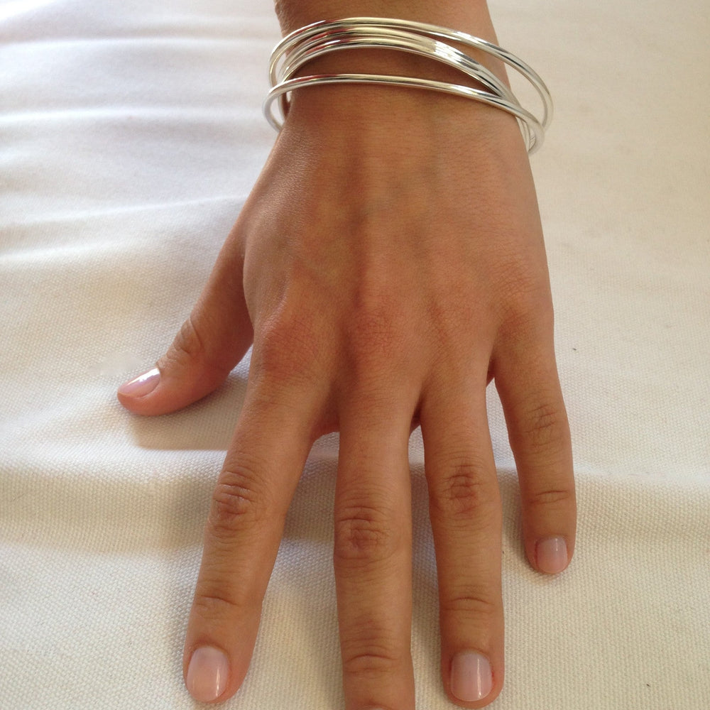 Model wearing Sterling Silver Bangle