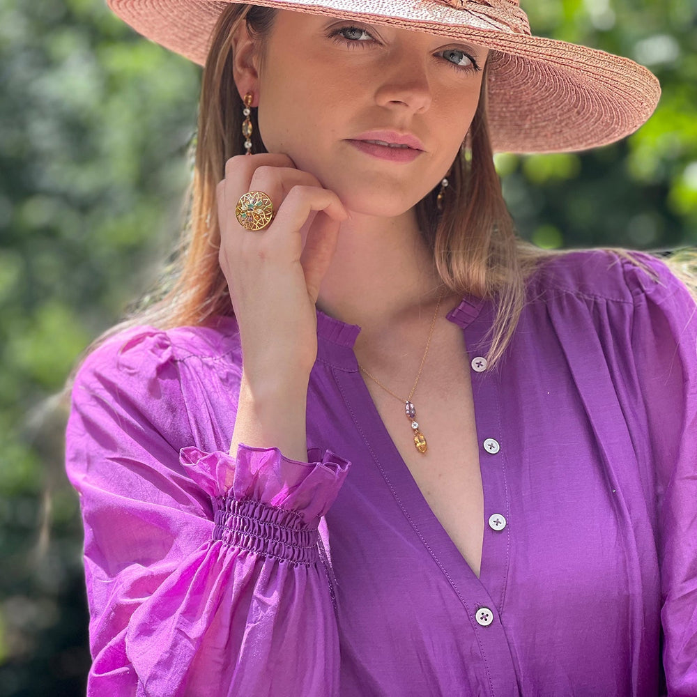 
                  
                    Model wearing purple amethyst, citrine and white topaz drop necklace
                  
                