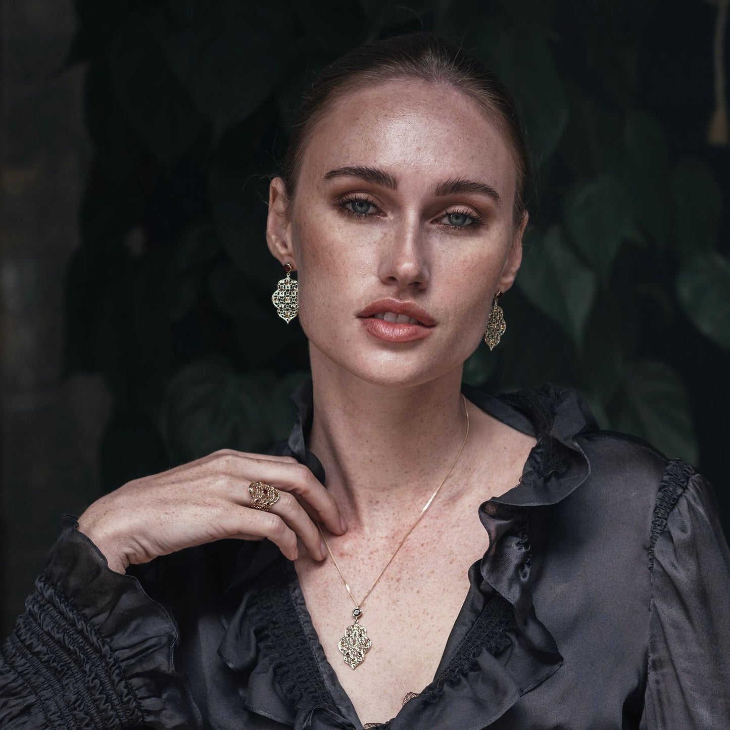 Model wearing Gold Filigree Earrings in Garnet & Citrine