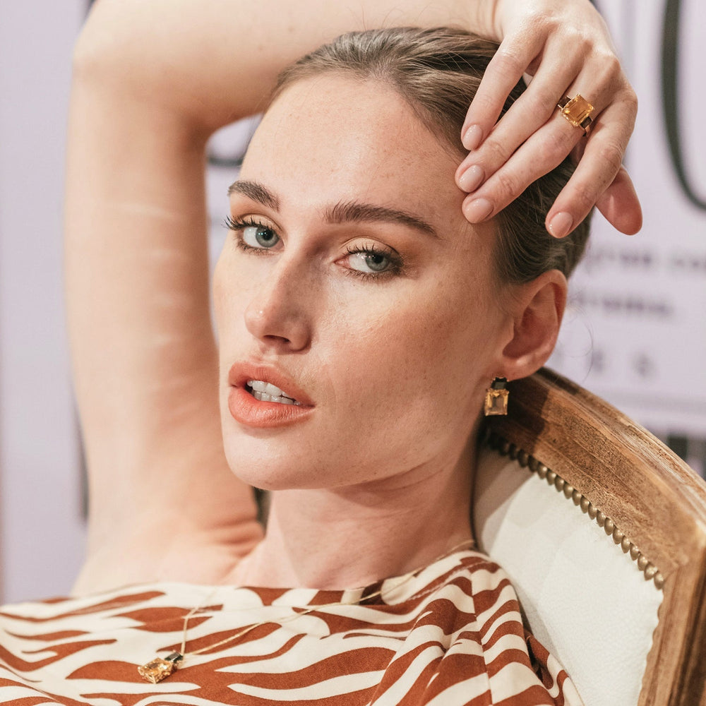 
                  
                    Model wearing Octagon Gold Necklace in Smoky Quartz & Citrine
                  
                