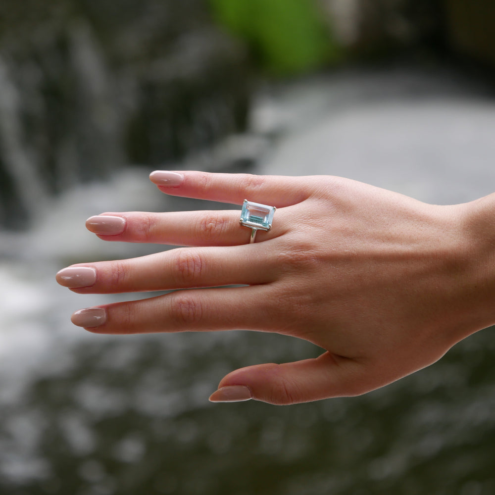 Model wearing Sterling Silver Sky Blue Topaz Ring