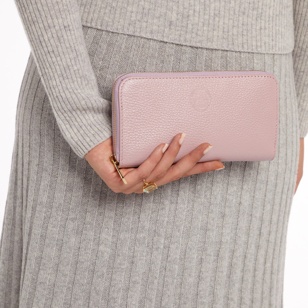 
                  
                    Model Holding Pink purse
                  
                