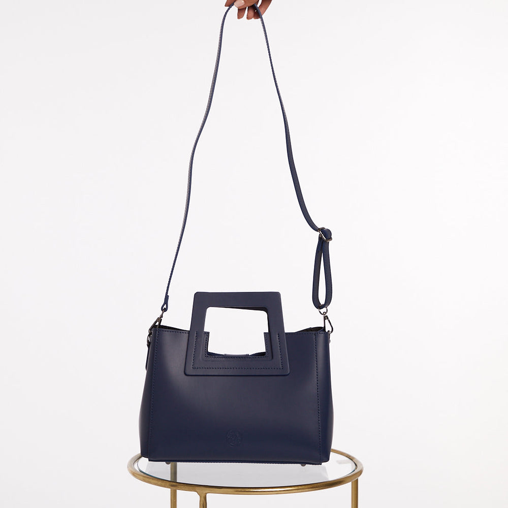 
                  
                    Far view of Large navy Blue Bag with long strap
                  
                
