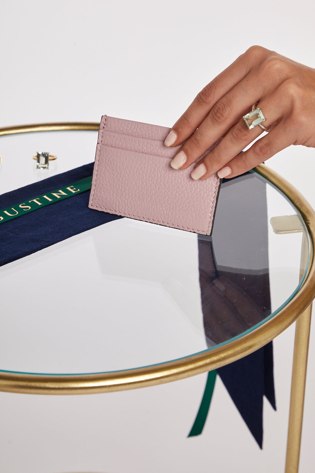 Model holding Pink Credit Card Holder
