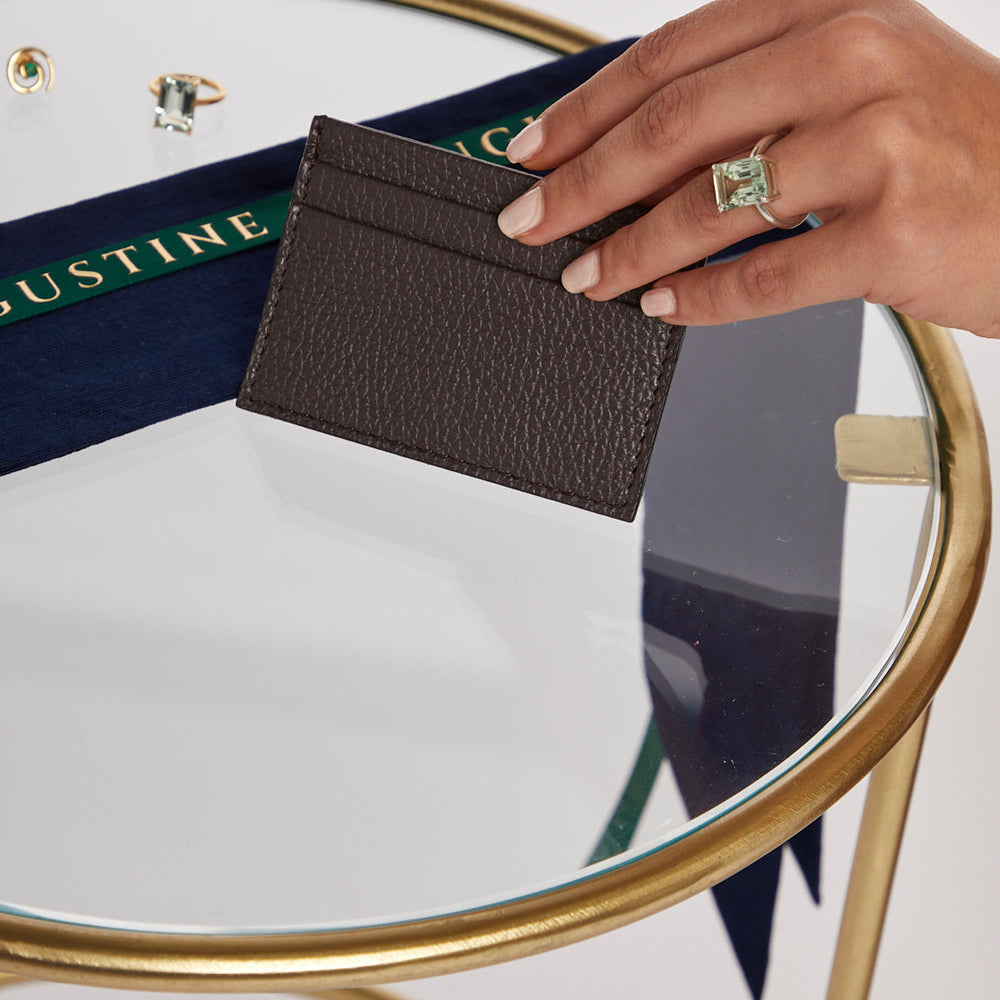 Model holding Brown Credit Card Holder