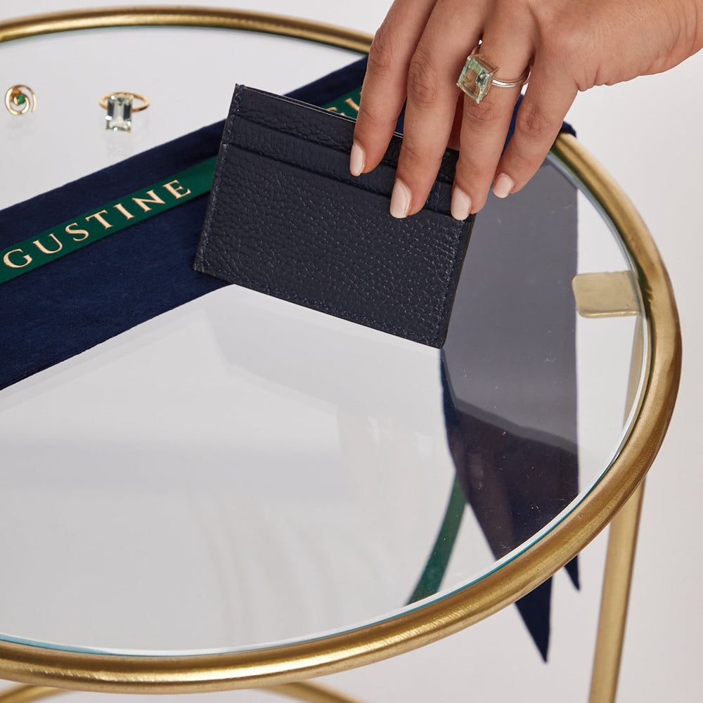 Model Holding the Navy Credit Card Holder
