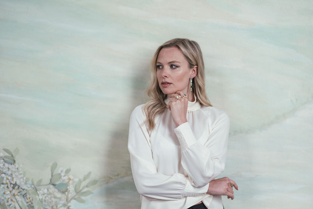 Model wearing Sky Blue Topaz and White Enamel Drum Ring