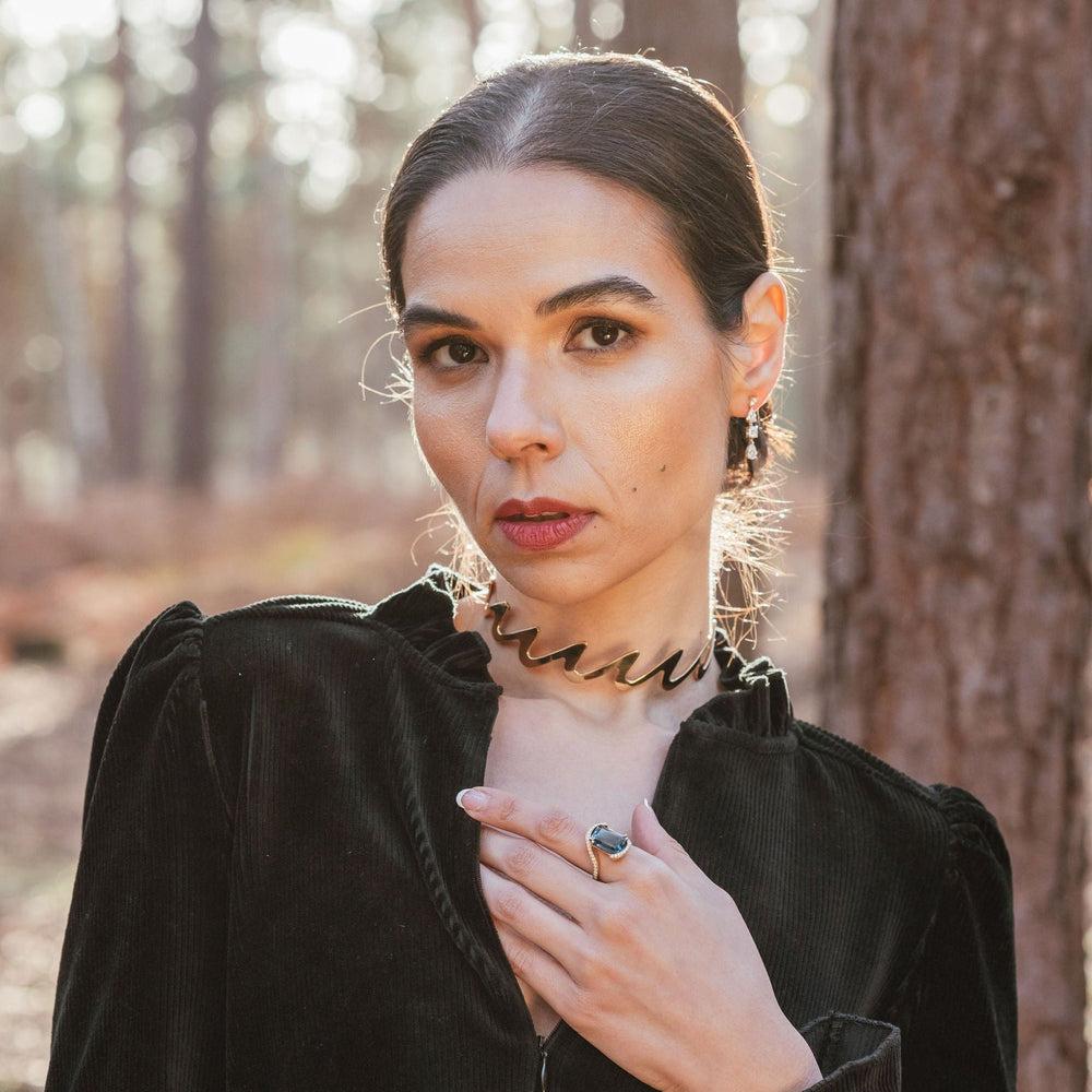 
                  
                    Model wearing Yellow Gold Vermeil Wedeln Torc
                  
                