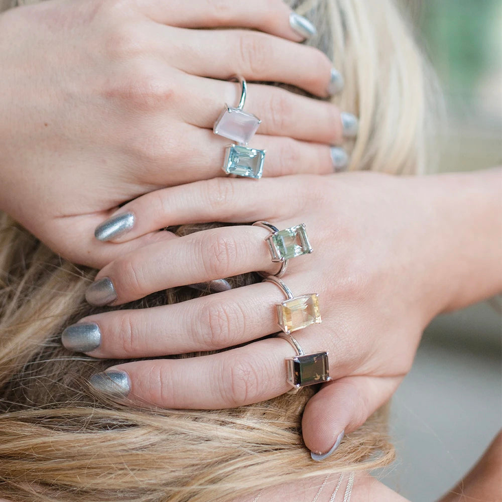 Close up shot of Model wearing White Gold Aquamarine Octagon Ring on her hand