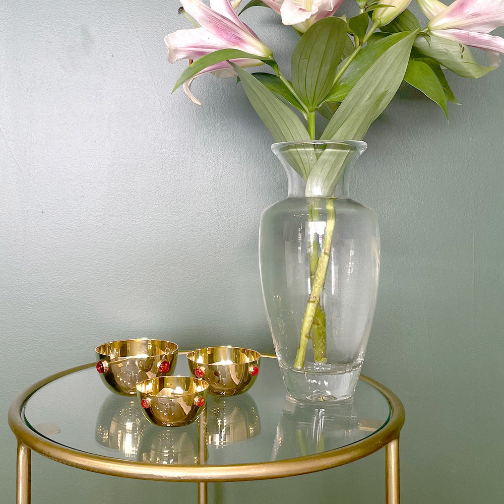
                  
                    Gold Plated Garnet Bowl set on display
                  
                