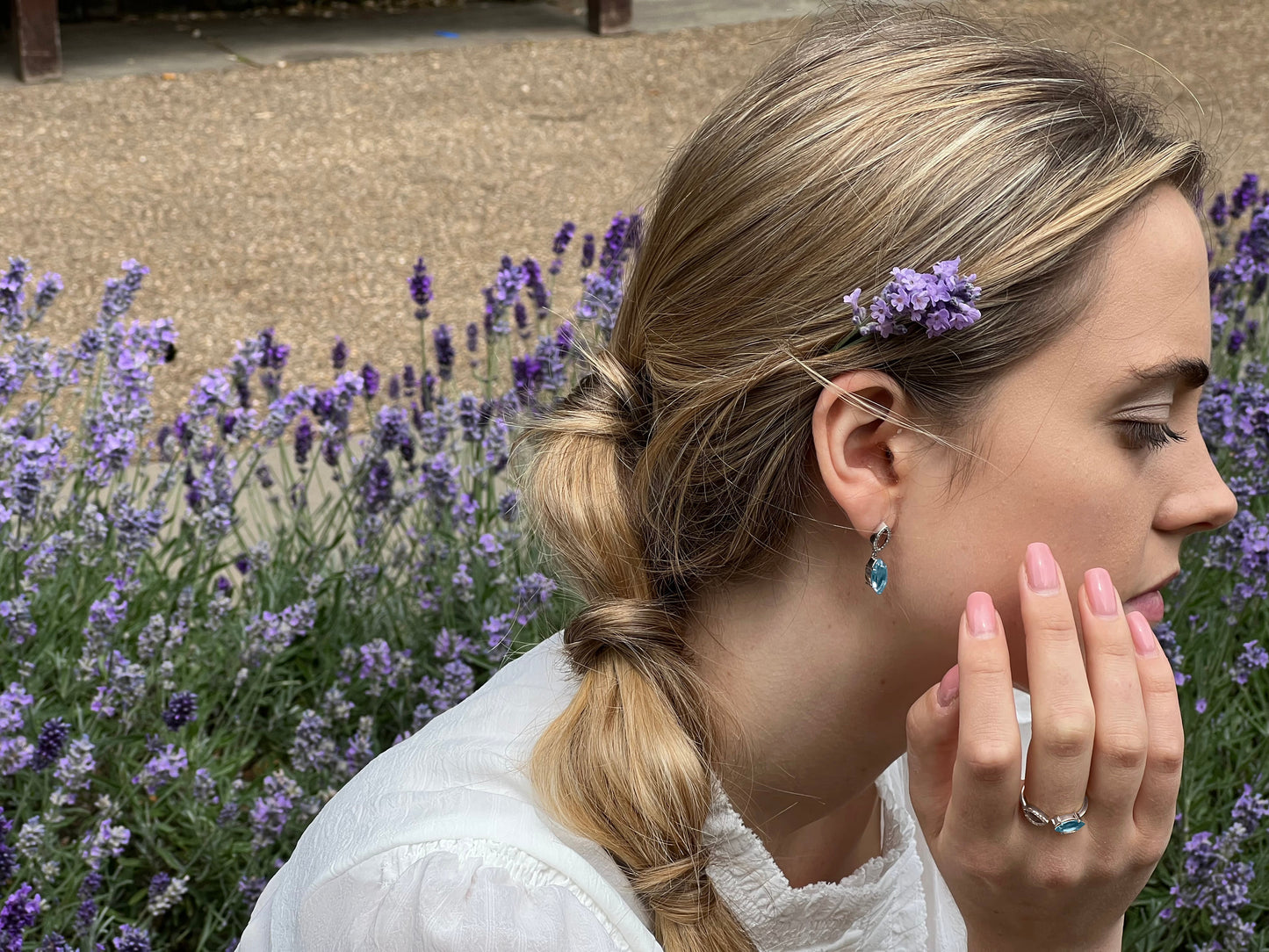 Model wearing Blue Topaz and Diamond Earrings